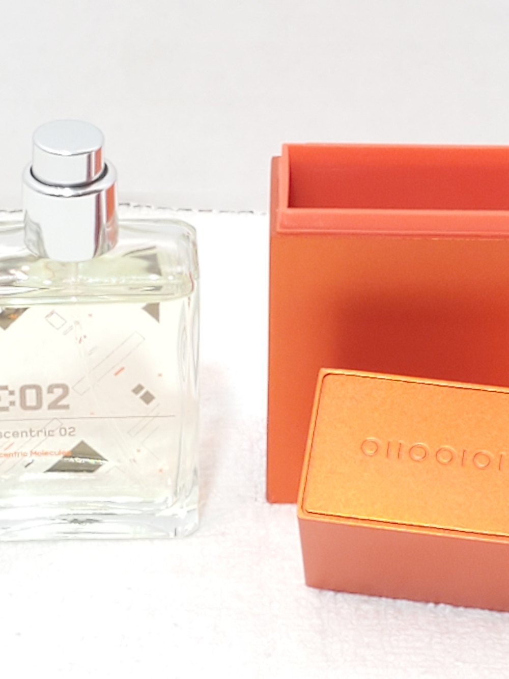 Escentric 02 by Escentric Molecules 1oz 30ml Travel Spray Orange Metal Case
